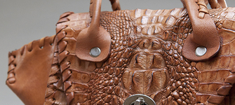 Cartera de piel de caimn