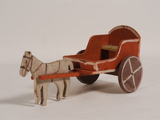 Coche de madera de juguete.