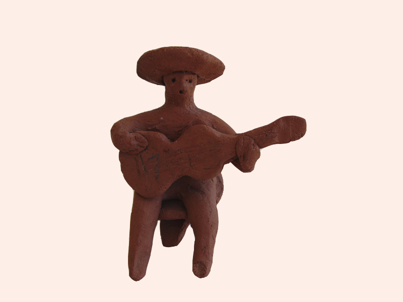 Cerámica de guitarrista