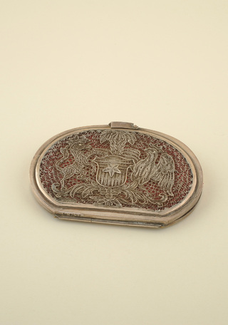 Patria y Simbolismo. El escudo nacional en las artes decorativas